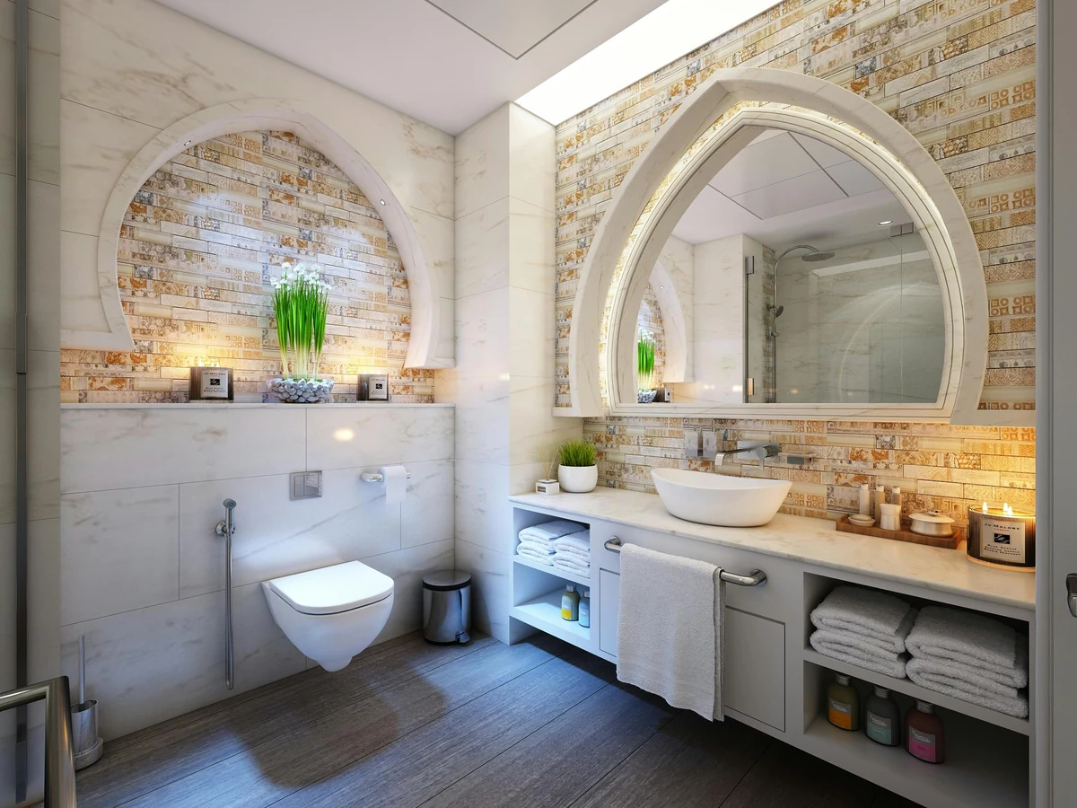 Ornate bathroom with exposed stonework painted by Cotswolds Decorators