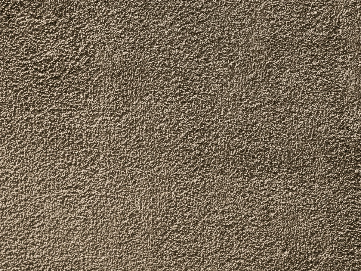 exterior-painting-closeup-rough-textured-cotswolds-decorators Close-up of rough textured exterior masonry painting in the Cotswolds