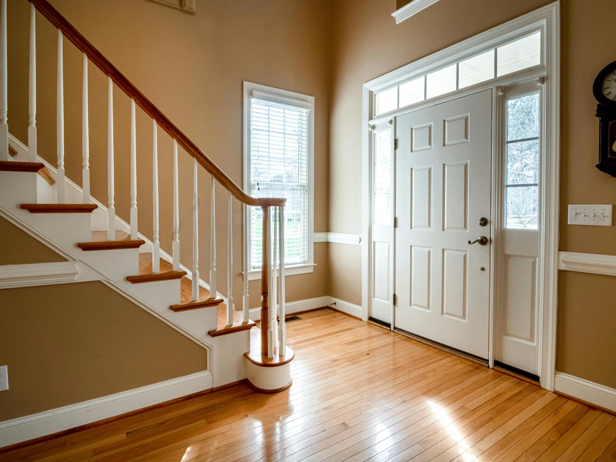 Local decorating expertise in the Cotswolds - traditional hallway and staircase painting by Cotswolds Decorators