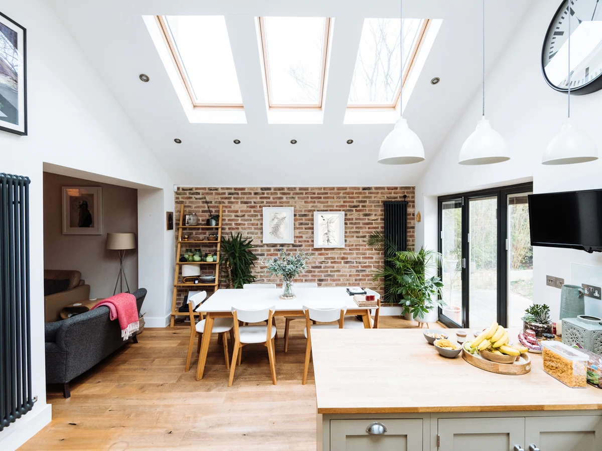 Open plan kitchen cabinet painting project by Cotswolds Decorators