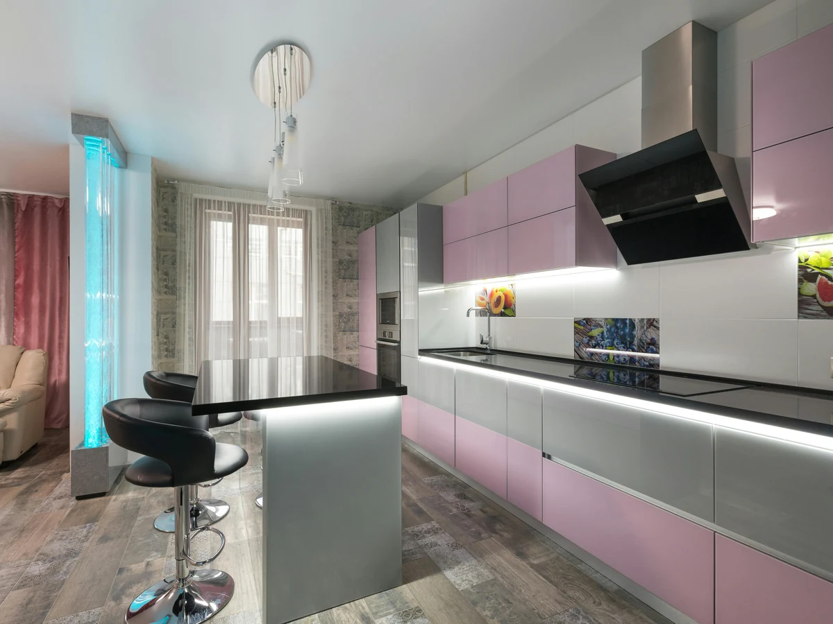 Pink and grey kitchen cabinet painting project by Cotswolds Decorators