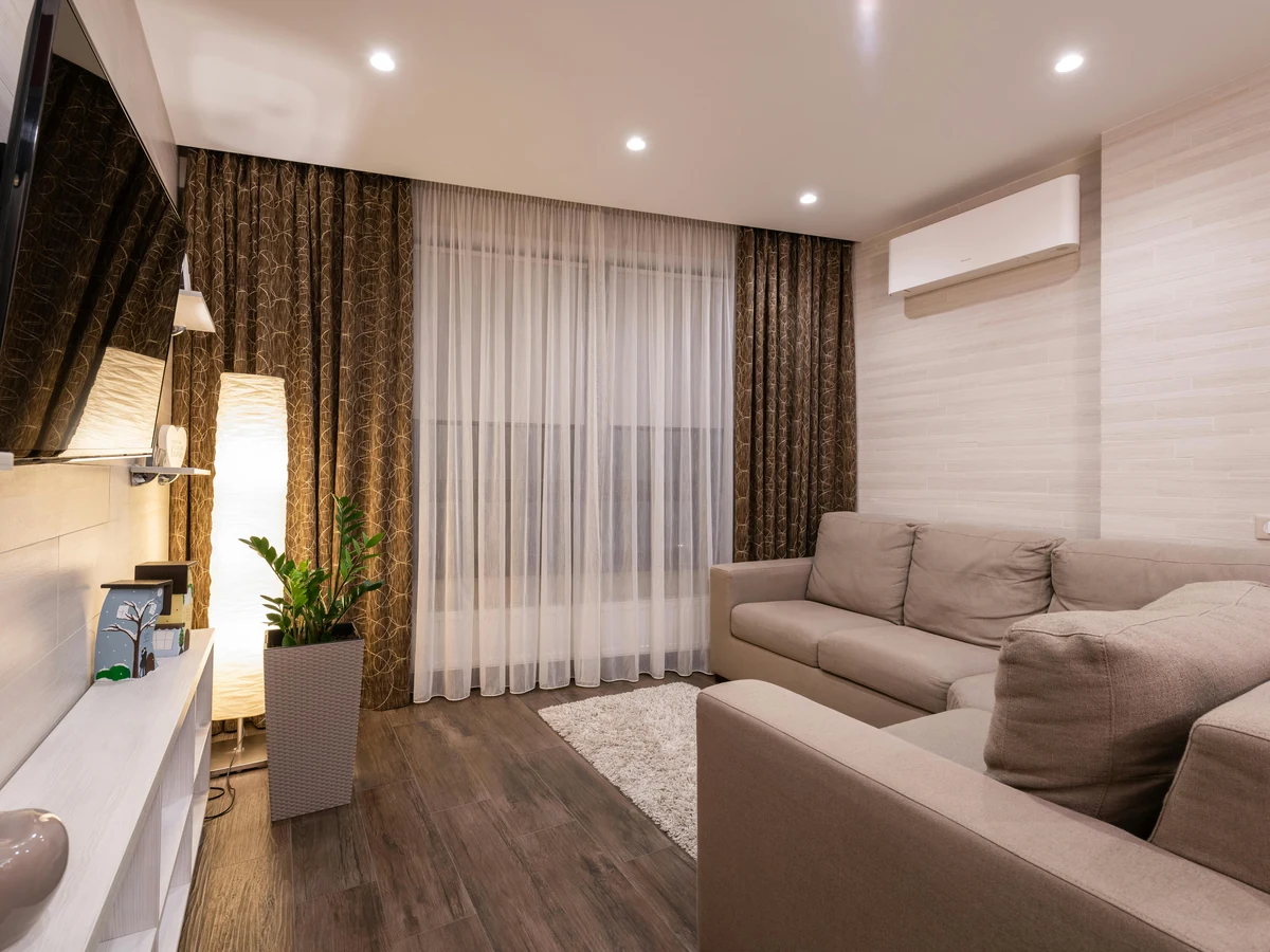 living-room-painting-beige-living-room-cotswolds-decorators Masonry painting on Cotswold stone property by Cotswolds Decorators, professional exterior painters